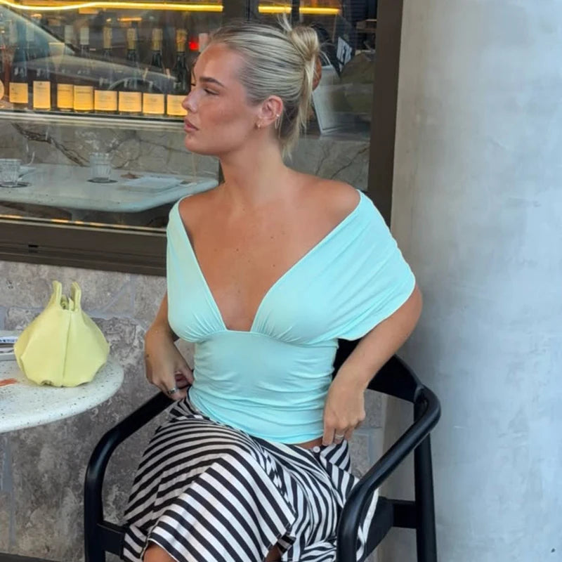 Backless draped shoulder blouse